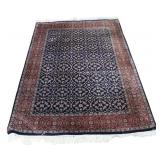 Vintage And Finely Hand Knotted Area Carpet.