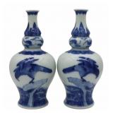 Pair of Chinese Blue and White Hawk Vases.