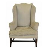 Antique Upholstered Wing Back Chair.