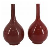 Near Pair of Chinese Ox Blood Bottleneck Vases.