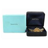 JEWELRY. Tiffany & Co. Portfolio Gold-tone Watch.