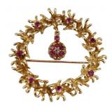 JEWELRY. 13kt Gold, and Ruby Wreath Form Brooch.