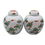 Pair of Chinese Bat and Peaches Lidded Urns.