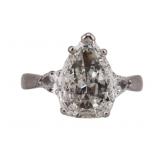 JEWELRY. Platinum and 3.59ct Pear Diamond Ring.
