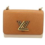 COUTURE. Louis Vuitton Epi Leather Two-Tone Twist