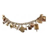 JEWELRY. Vintage 14kt Charm Bracelet with (13)