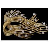 JEWELRY. 17.5kt Gold and Diamond Spray Brooch.