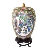 Chinese porcelain lidded jar on a wooden stand