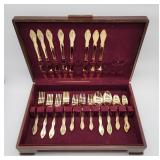 Gold tone Customcraft stainless flatware 32 pcs