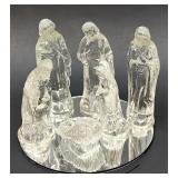 Petite glass nativity set on round mirror