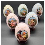 MJ Hummel collector eggs on wood bases