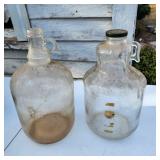 2 antique 1 gal glass jugs
