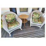 Pair braided wicker chairs 1 rocks