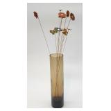 Vintage metal flowers in a smoked glass vase