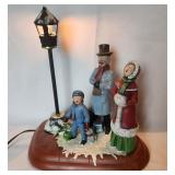 Hamdmade ceramic Christmas caroling family lighted