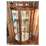 Solid oak lighted curio cabinet