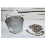 Medium duty chain & a bucket to put it in