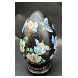 Cloisonne egg on a wooden stand