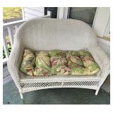 Braided wicker sofa