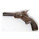 Antique Pluck cast iron toy gun