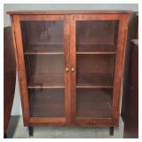 Glass door bookcase 49'h x38w x 15d