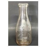 Carolina Dairies embossed quart milk bottle