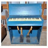 Antique portable pump organ works