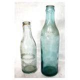 Vintage soda bottles embossed