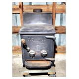 Cast iron Old Mill wood stove