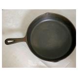 Cast iron frying pan marked 8E