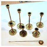 Graduated brass candlesticks & snuffer