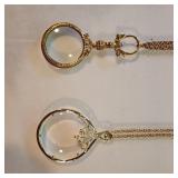 2 magnifying glass necklaces