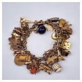 14k gold charm bracelet w 14k & 18k gold charms