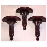three decorative wooden wall shelves