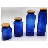blue glass canisters
