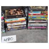 stacks of movies / tv shows