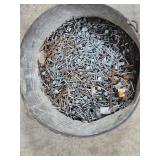 metal bucket of nails
