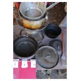 Propane fryer with cast iron