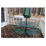 Table with umbrella and chairs