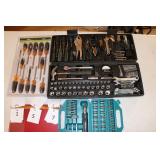 Screw drivers and tool sets