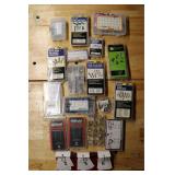 Assortment of screws, grease fittings, and springs