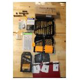 Assortment of drill bits and rivets
