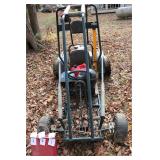 Go kart with helmet and gas can