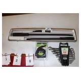 25 ft tape measure, wrench set, and pry bars