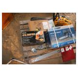 2 chainsaws and accessories