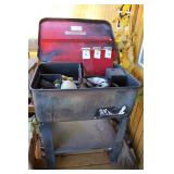 Parts washer with contents