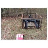 Forks with hydraulic grapple for skid steer