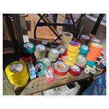 shelf of random tape rolls