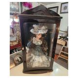 collectible doll in case