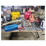 tools, shackles, motor, items on tables